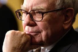 Warren Buffett: forecasts profitibility for banks, while giving billions to charity