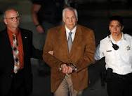 Jerry Sandusky Verdict - Guilty on 45 of 48 Counts of Sexual Abuse - led to jail in handcuffs