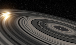 Distant Ringed World Dwarfs Those of Saturn